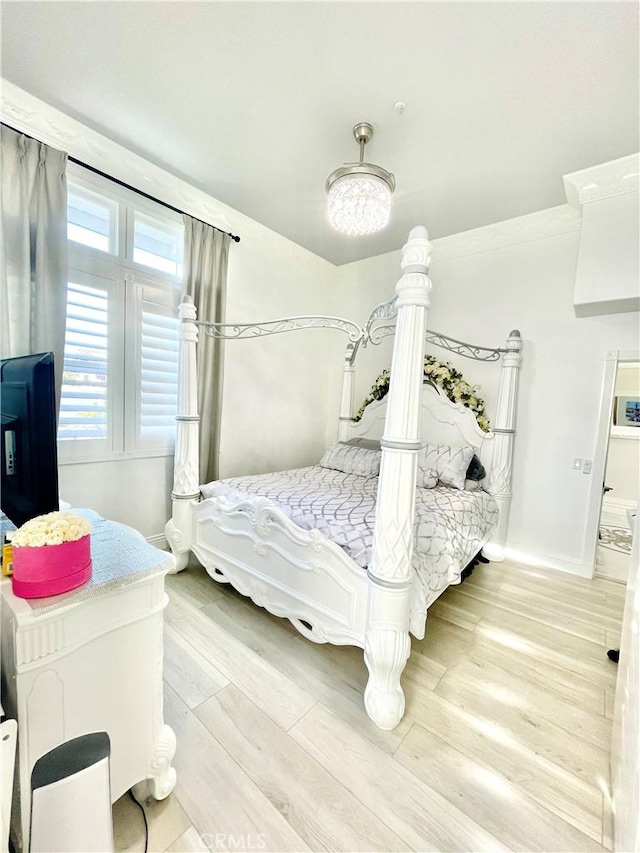 bedroom featuring light hardwood / wood-style floors