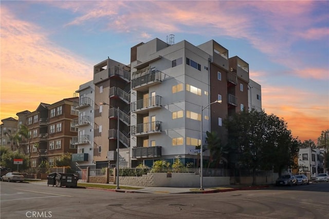 view of outdoor building at dusk