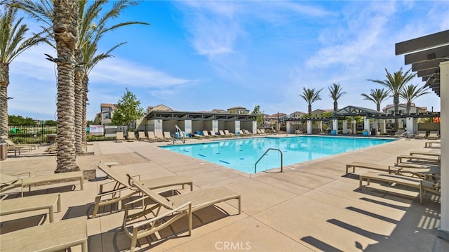 view of pool featuring a patio