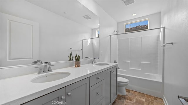 full bathroom with vanity, toilet, and bathing tub / shower combination