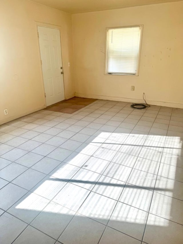 view of tiled spare room