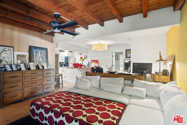 bedroom with ceiling fan, beam ceiling, wooden ceiling, light hardwood / wood-style floors, and stainless steel refrigerator