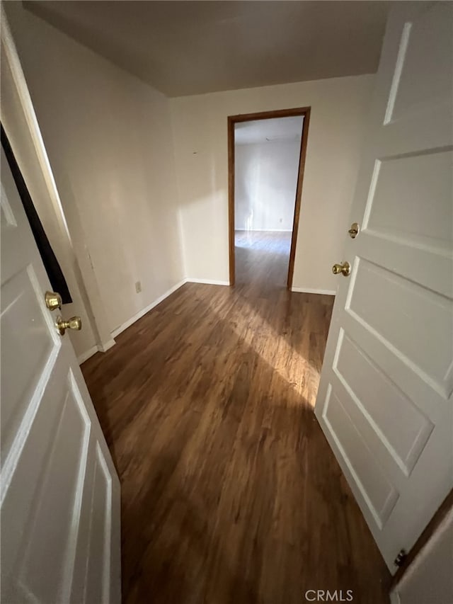 2820 S Budlong Ave, Los Angeles, CA 90007 - interior space featuring dark wood-style floors and baseboards