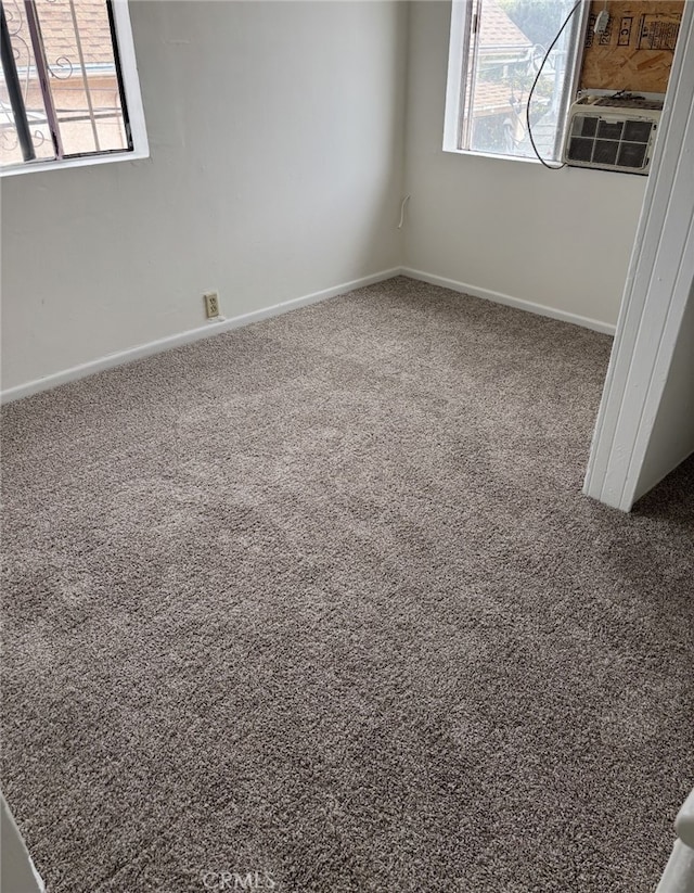 2820 S Budlong Ave, Los Angeles, CA 90007 - spare room featuring plenty of natural light, baseboards, and carpet