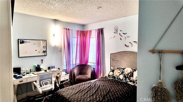 bedroom with a textured ceiling