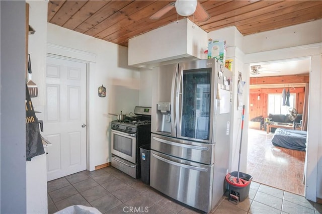 kitchen featuring wooden ceiling, stainless steel appliances, tile patterned flooring, and ceiling fan