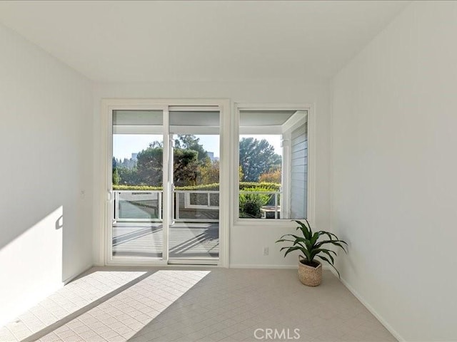 interior space featuring baseboards