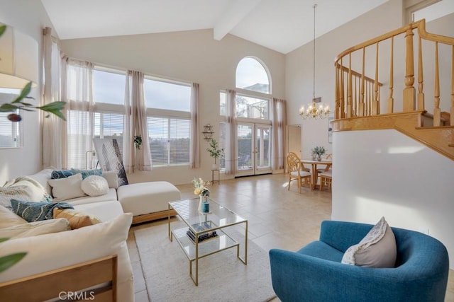 living room with beam ceiling, a chandelier, and high vaulted ceiling