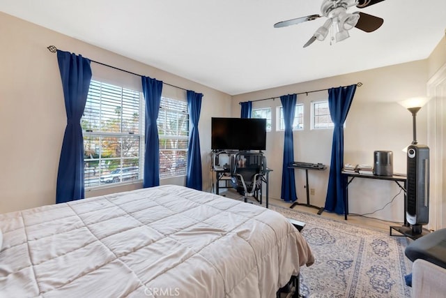 bedroom featuring ceiling fan