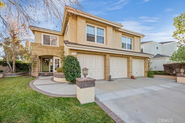 23014 Weymouth Pl, Valencia, CA 91354 - view of front facade with a garage and a front lawn