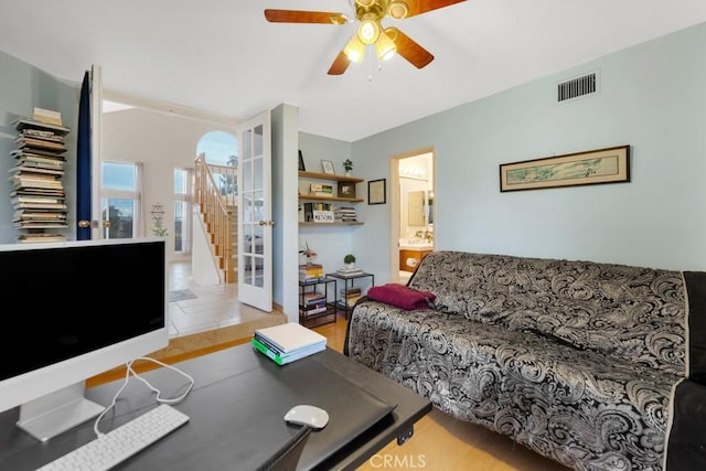 living room with ceiling fan