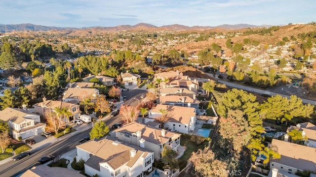 drone / aerial view featuring a mountain view