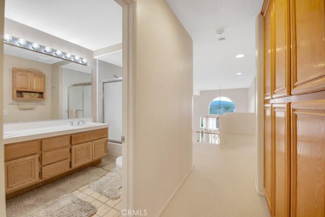 bathroom with toilet and vanity