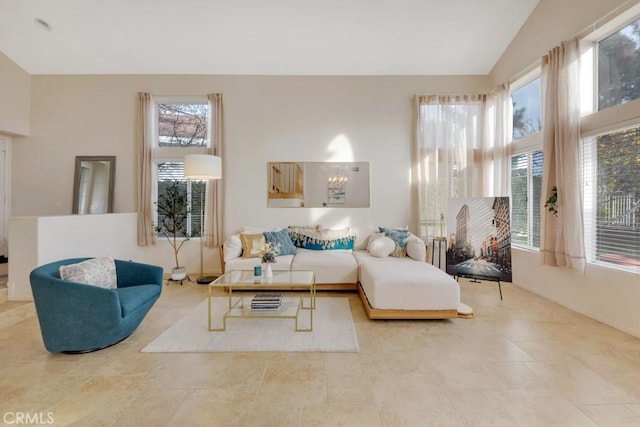 living room with a towering ceiling