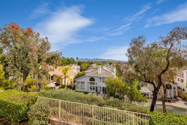 view of front of home with a mountain view