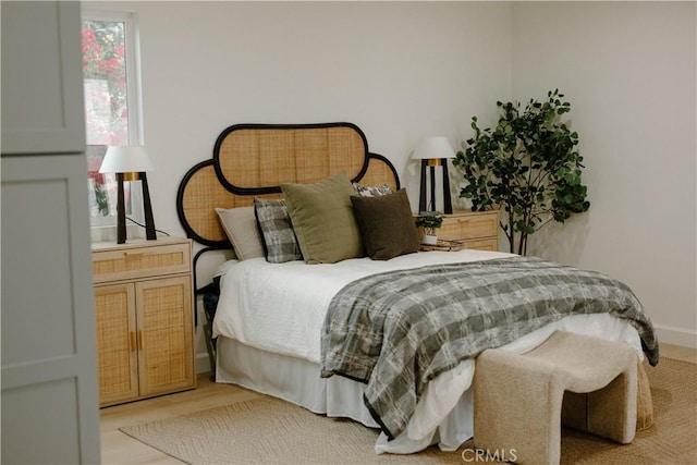 bedroom featuring light wood-type flooring