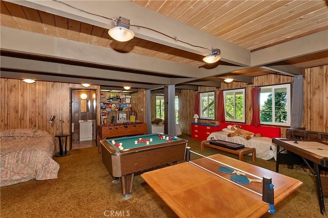 recreation room with beamed ceiling, carpet floors, wooden walls, and pool table