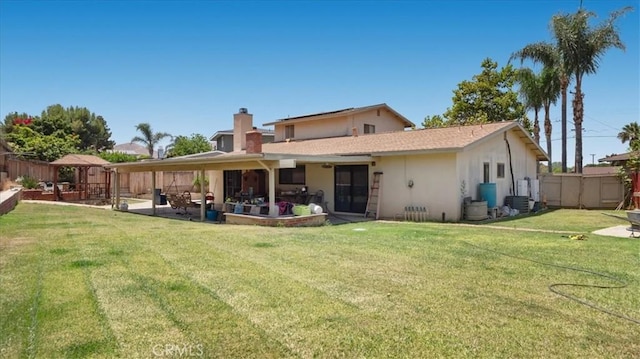 145 Carlota Way, Riverside, CA 92507 - rear view of house with a patio area, a gazebo, a chimney, and stucco siding