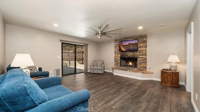 145 Carlota Way, Riverside, CA 92507 - living area with ceiling fan, dark wood finished floors, a stone fireplace, and recessed lighting