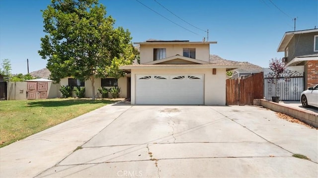 145 Carlota Way, Riverside, CA 92507 - traditional-style house featuring stucco siding and concrete driveway