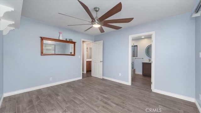 145 Carlota Way, Riverside, CA 92507 - unfurnished bedroom featuring wood finished floors, a ceiling fan, and ensuite bathroom
