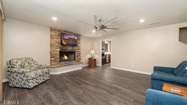 145 Carlota Way, Riverside, CA 92507 - living room featuring a ceiling fan, dark wood-style flooring, a stone fireplace, and recessed lighting