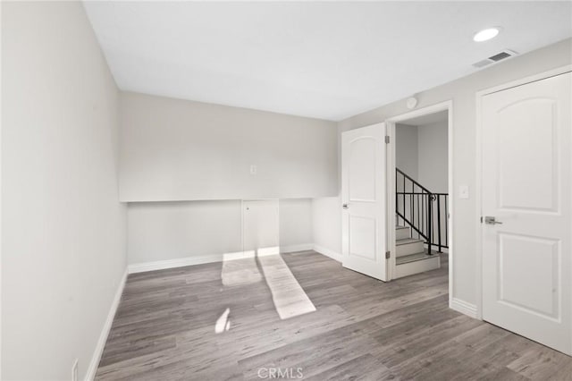 empty room featuring hardwood / wood-style floors