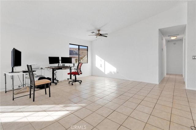 office space featuring light tile patterned floors and ceiling fan