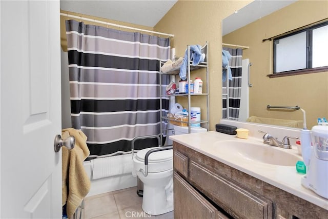 bathroom with walk in shower, tile patterned flooring, vanity, and toilet