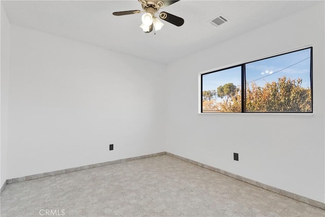 unfurnished room with ceiling fan