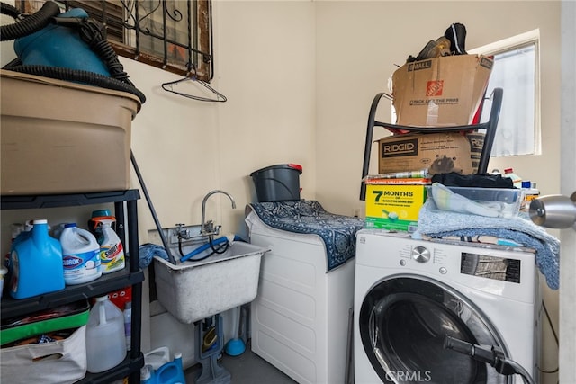 laundry area with washer / dryer