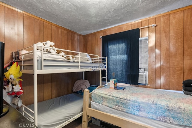 bedroom with wooden walls