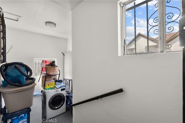 washroom with washer / clothes dryer