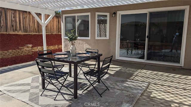 view of patio featuring a pergola