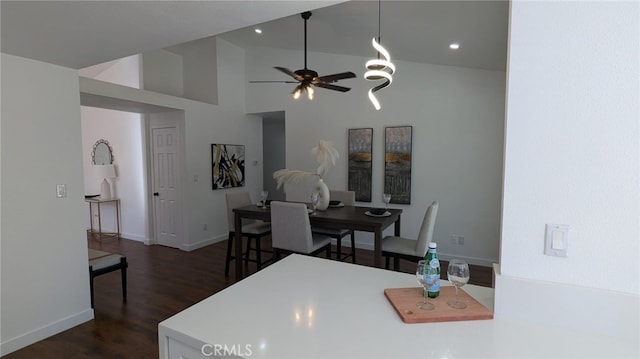 kitchen with dark hardwood / wood-style floors, high vaulted ceiling, and ceiling fan