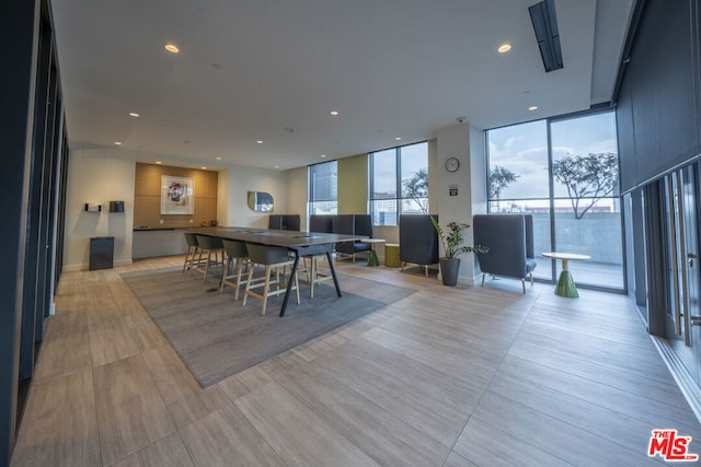 dining area featuring expansive windows