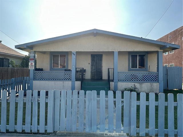 view of front of home featuring covered porch