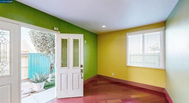 doorway to outside featuring wood-type flooring