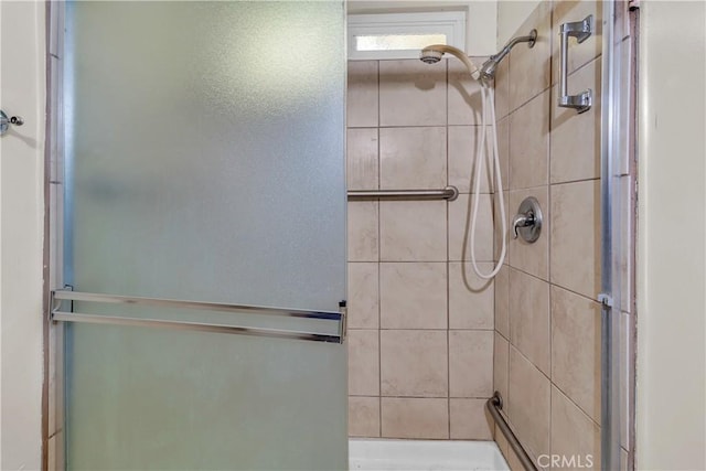 bathroom featuring an enclosed shower