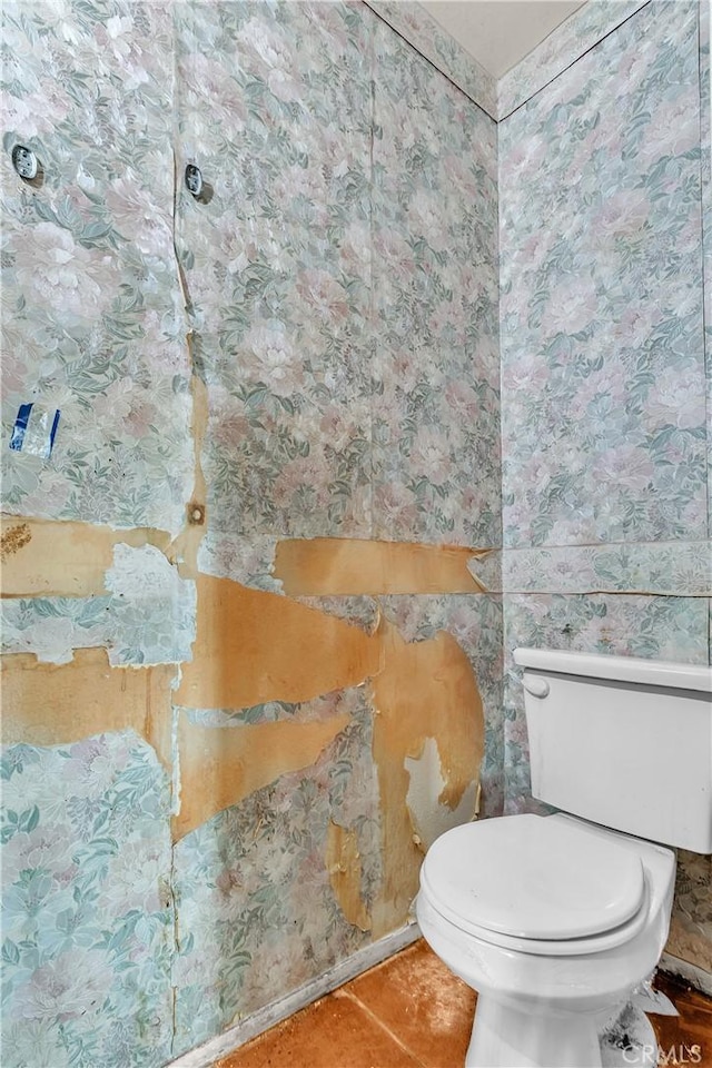 bathroom with tile patterned floors and toilet