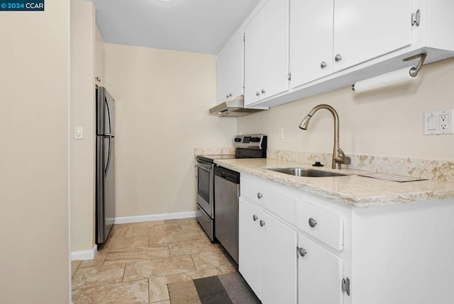 kitchen featuring white cabinets, stainless steel appliances, and sink