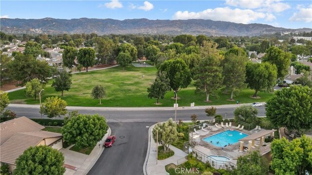 birds eye view of property featuring a mountain view