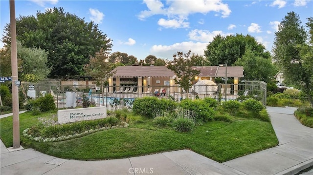 view of home's community with a swimming pool