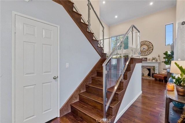 stairs featuring wood-type flooring