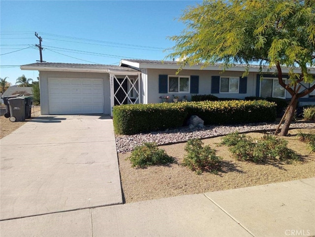 ranch-style house featuring a garage