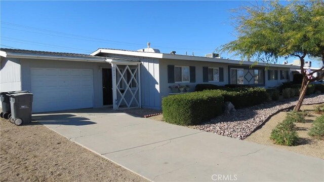 ranch-style home with a garage