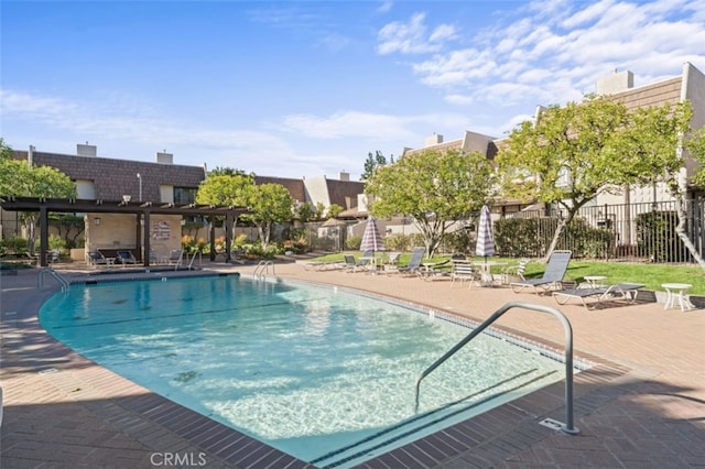 view of swimming pool with a patio area