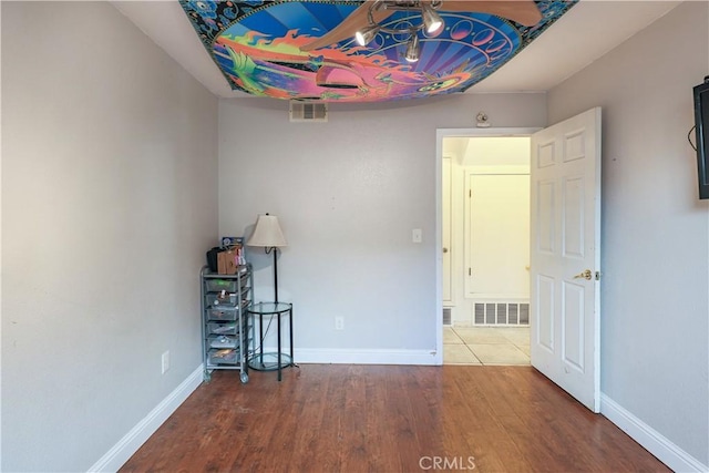 unfurnished bedroom featuring wood-type flooring