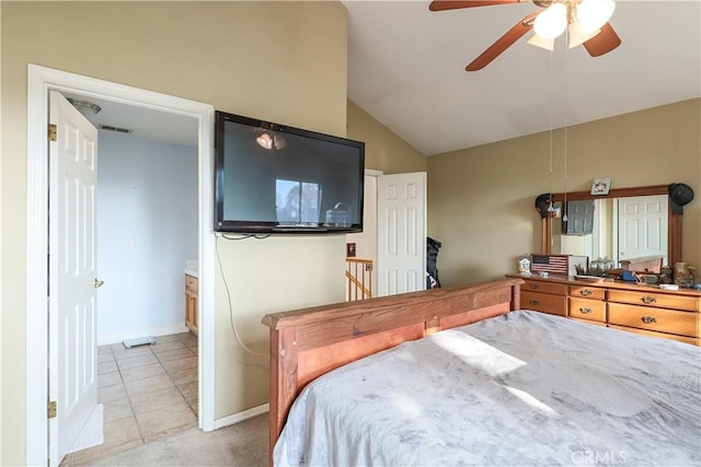 bedroom featuring light tile patterned floors, ceiling fan, and lofted ceiling