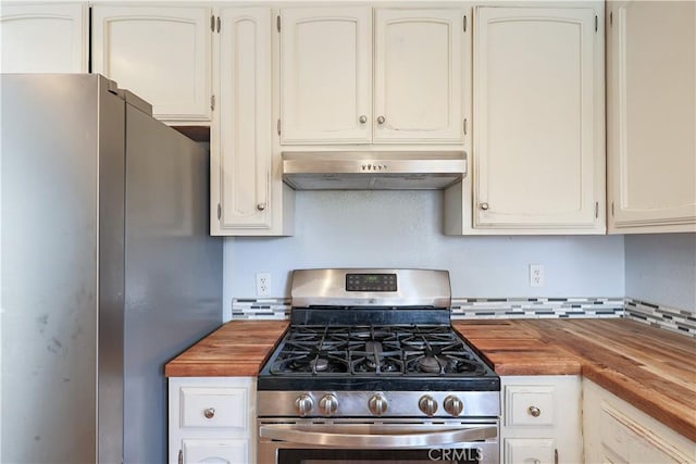 kitchen featuring butcher block counters, white cabinets, and appliances with stainless steel finishes